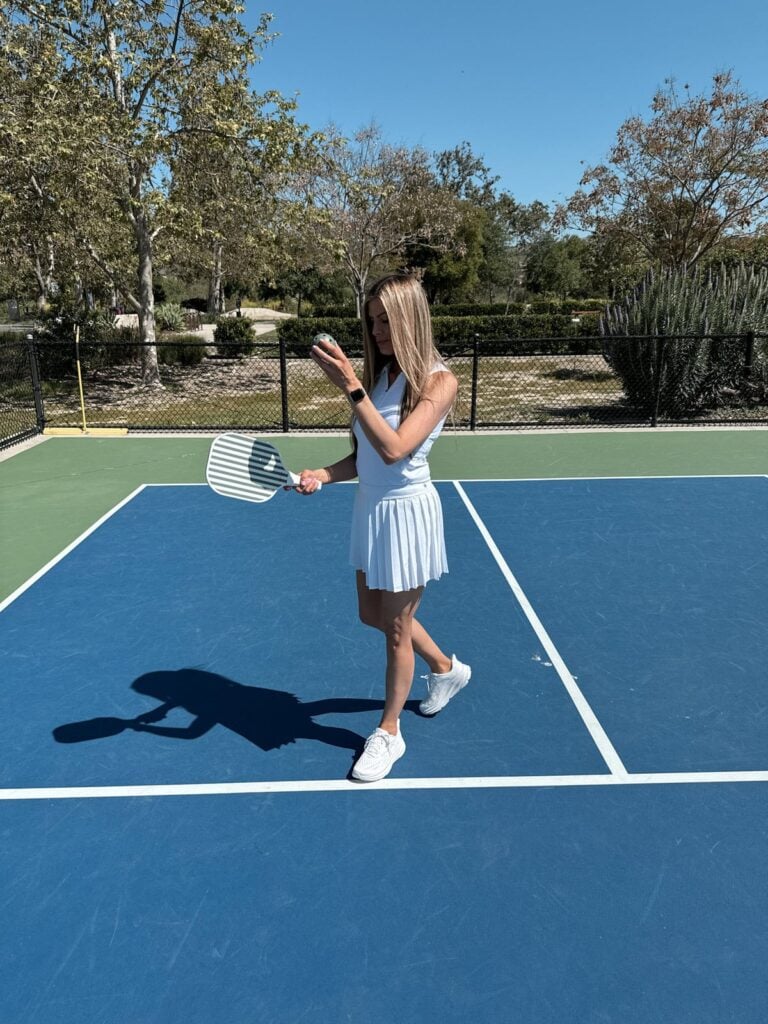 Corrine wearing Hoka Clifton 9 during her pickleball game