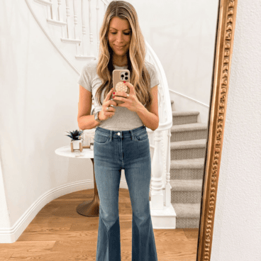 Corrine wearing high waist flare jeans